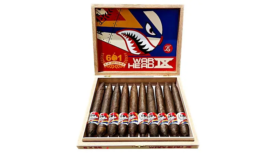 An open box of Espinosa 601 La Bomba Warhead IX cigars, with shark-mouth art inside the lid